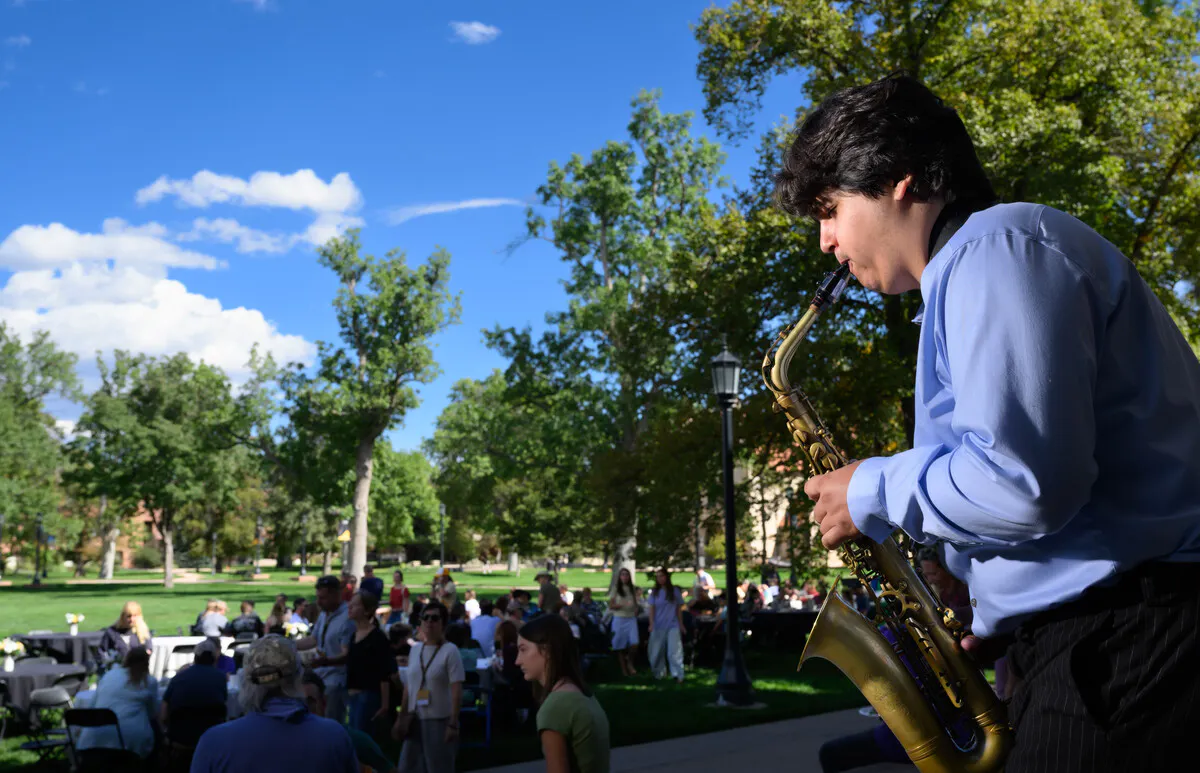 Joshua Briley ’28 with the Wild Goose Jazz Collective plays the saxaphone for students and families during “Brunch Before Goodbyes on Tava Quad” as Colorado College Family Weekend activities wrapped up Sept. 27. Photo by Mark Reis